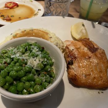 Yosemite Ranch - Salmon, peas with Parmesan and mashed potatoes - Steakhouses Near Me - Fresno, California Yosemite Ranch - Salmon, peas with Parmesan and mashed potatoes - Steakhouses Near Me - Fresno, California
