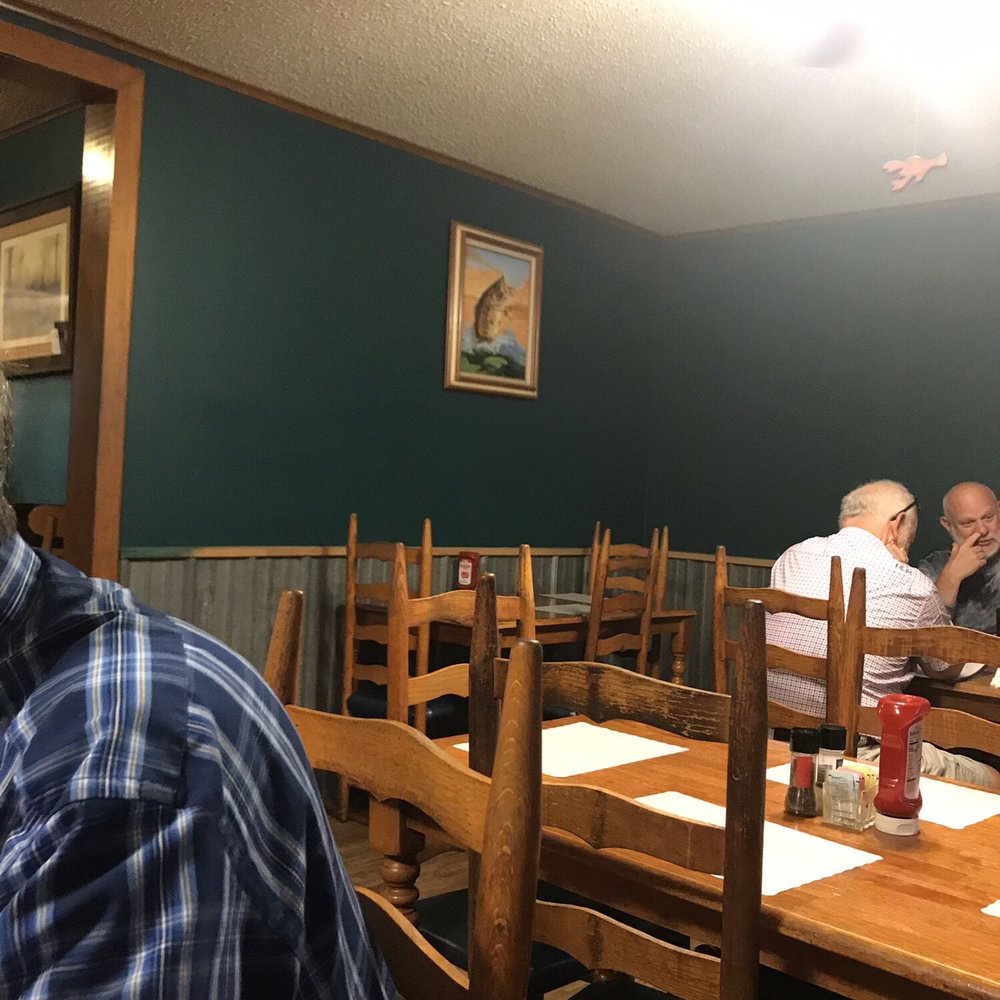 Sevin's - a man sitting at a table in a restaurant - Cajun/Creole Near Me - Farmerville, Louisiana Sevin's - a man sitting at a table in a restaurant - Cajun/Creole Near Me - Farmerville, Louisiana