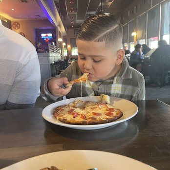 Strings Italian Cafe - Kids pepperoni pizza so delicious - Italian Near Me - Visalia, California Strings Italian Cafe - Kids pepperoni pizza so delicious - Italian Near Me - Visalia, California