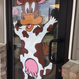 a cow painted on the door