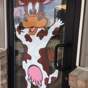 Lake City Creamery - a cow painted on the door - Ice Cream & Frozen Yogurt Near Me - Celina, Ohio