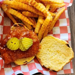 Frozen Rooster - Hot honey chicken sandwich with Cajun fries.