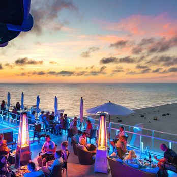 Spinners Rooftop Grille - Outdoor seating area - Lounges Near Me - St. Pete Beach, Florida Spinners Rooftop Grille - Outdoor seating area - Lounges Near Me - St. Pete Beach, Florida
