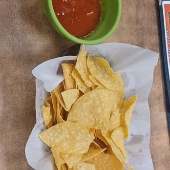 3 Compadres - a bowl of chips and a bowl of ketchup - Mexican Near Me - Hebron, Nebraska