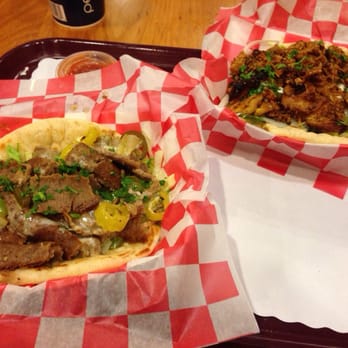 Greek Cravings - Left: Spicy Philly gyro, right: chicken gyro. - Greek Near Me - St Cloud, Minnesota