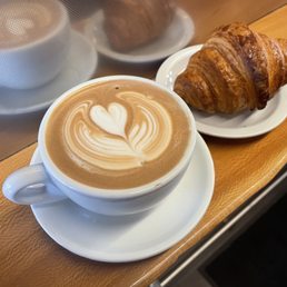 Latte and a croissant. What can I say, I am a basic man with expensive needs