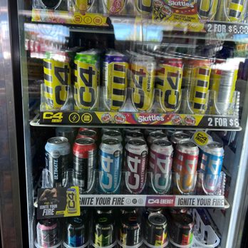 Gulf Oil - a vending machine filled with cans of soda - Gas Stations Near Me - Deer Park, New York