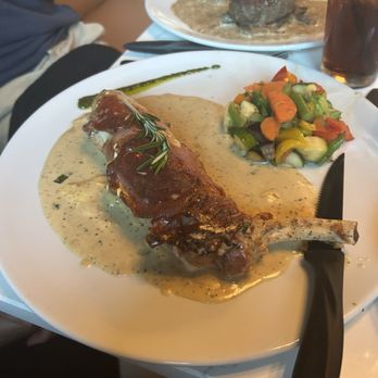 Acqua Ragazza - Stuff pork chop wrapped in prosciutto. - Italian Near Me - Mooresville, North Carolina Acqua Ragazza - Stuff pork chop wrapped in prosciutto. - Italian Near Me - Mooresville, North Carolina