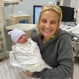 Doctor holding baby