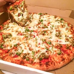 Santa Maria Ristorante & Pizzeria - Pepperoni, green pepper, mushroom, and green olive. The generous portion of cheese is included.