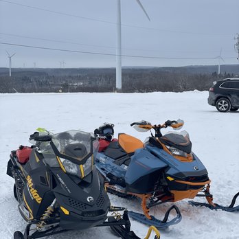 Flat Rock Inn - two snowmobiles and a wind turbine - Hotels Near Me - Lowville, New York Flat Rock Inn - two snowmobiles and a wind turbine - Hotels Near Me - Lowville, New York