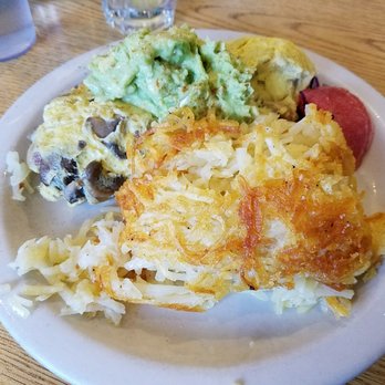 Glo's - custom avocado, mushroom, and sausage omelette with hash browns. skip the avocado as it was kinda gross - Breakfast & Brunch Near Me - Seattle, Washington