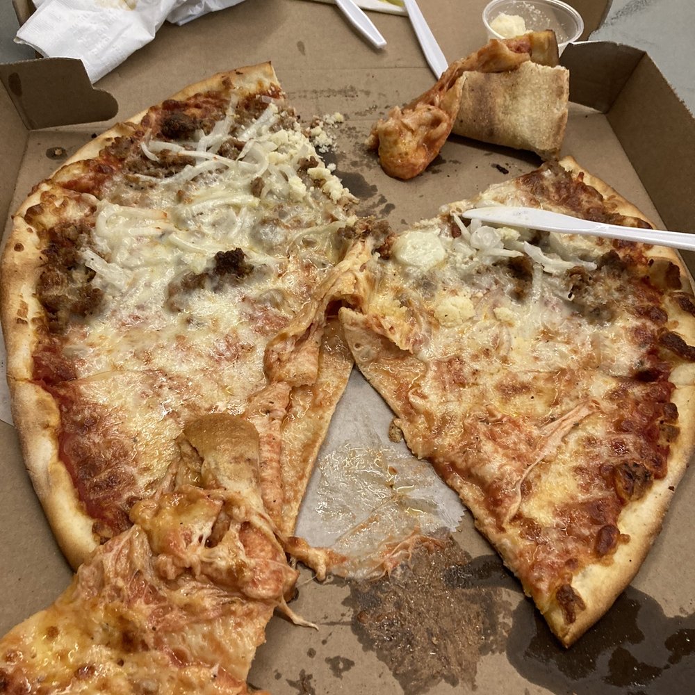 Pizza 16" Original Cheese Pizza not cooked enough and they didn't slice it well... Pizza 16" Original Cheese Pizza not cooked enough and they didn't slice it well...