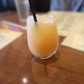 Dame's Chicken and Waffles - Peach mimosa - New American Near Me - Cary, North Carolina Dame's Chicken and Waffles - Peach mimosa - New American Near Me - Cary, North Carolina