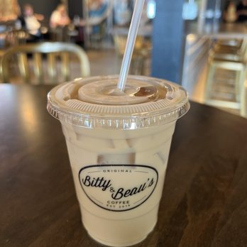 Bitty & Beau's Coffee - Cold vanilla latte with almond milk - Coffee & Tea Near Me - Waco, Texas