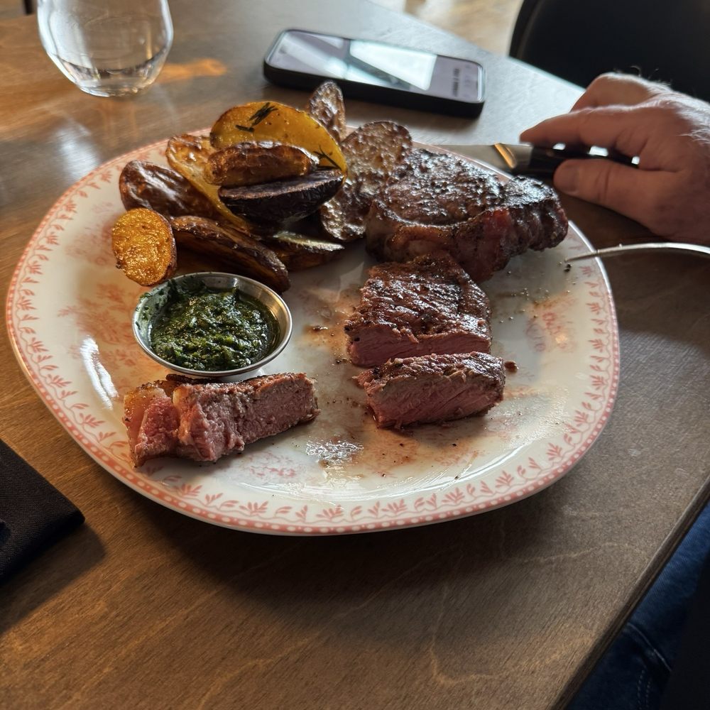 The Western - Wood-fired New York Center Cut Strip cooked medium rare with fingerlings, skipped the broccolini. - Cocktail Bars Near Me - Ouray, Colorado The Western - Wood-fired New York Center Cut Strip cooked medium rare with fingerlings, skipped the broccolini. - Cocktail Bars Near Me - Ouray, Colorado