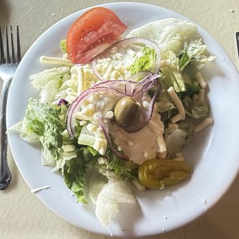 Erio's Ristorante - Dinner salad with blue cheese dressing - Italian Near Me - Saint Peters, Missouri Erio's Ristorante - Dinner salad with blue cheese dressing - Italian Near Me - Saint Peters, Missouri