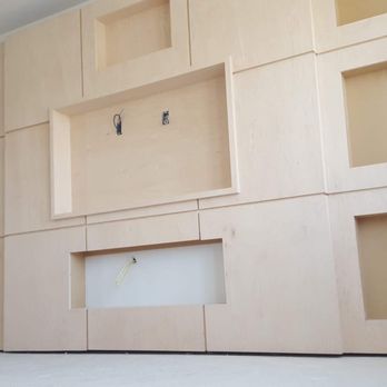 Right Group Construction - TV unit finished in maple wood - Carpenters Near Me Right Group Construction - TV unit finished in maple wood - Carpenters Near Me