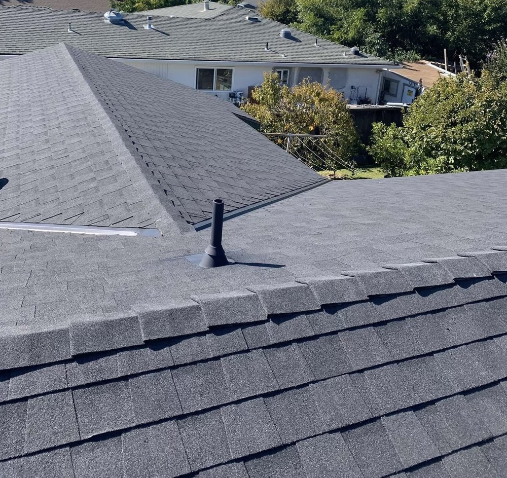 Slide of Her Construction Roofing Specialists 