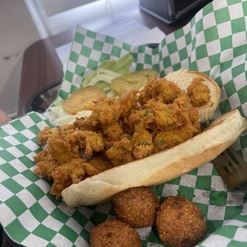 Lucky Seafood - Fried crawfish po boy with hush puppies - Seafood Near Me - George West, Texas Lucky Seafood - Fried crawfish po boy with hush puppies - Seafood Near Me - George West, Texas