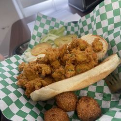 Lucky Seafood - Fried crawfish po boy with hush puppies