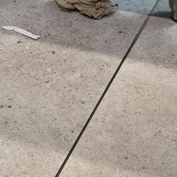 Buffalo Wild Wings Go - Trash on the floor - Sports Bars Near Me - Flushing, New York