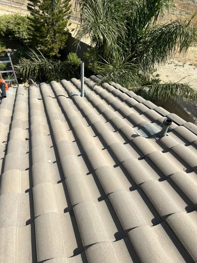 Slide of Blue J’s Roofing