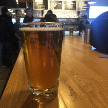 Pins Mechanical - One of their draft beers with the view of their full list in the back. - Bowling Near Me - Dublin, Ohio Pins Mechanical - One of their draft beers with the view of their full list in the back. - Bowling Near Me - Dublin, Ohio