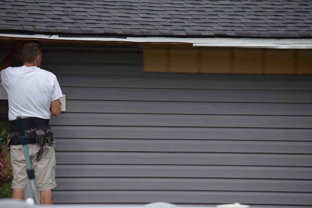 Slide of Roland's Painting & Construction