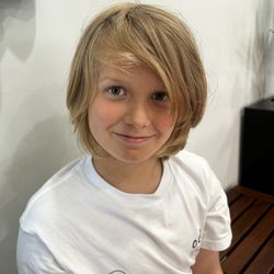 Elite Barber Parlour - My son got his haircut and they did a tremendous job. They did a quick transformation for the summer and the precision is top-notch.
