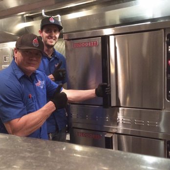 Twin Temp Services - Ask us about our repair and install services for cooking equipment. Pictured is Lannis and Cody after installing new ovens. - Heating & Air Conditioning/HVAC Near Me