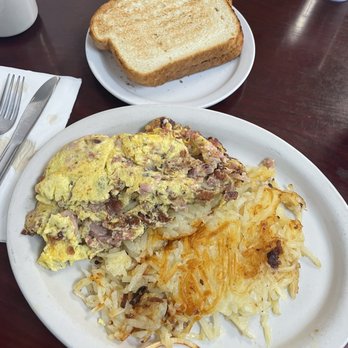 Paul's Country Kitchen - Meat lovers omelette with hash browns and white toast. - American Near Me - Placentia, California Paul's Country Kitchen - Meat lovers omelette with hash browns and white toast. - American Near Me - Placentia, California