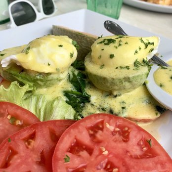 The Dune Deck Cafe - Eggs Benedict over avocado. - Breakfast & Brunch Near Me - Lantana, Florida The Dune Deck Cafe - Eggs Benedict over avocado. - Breakfast & Brunch Near Me - Lantana, Florida