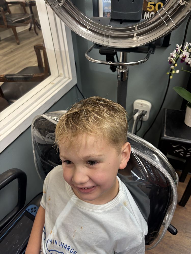 Denman’s Barbershop Logo