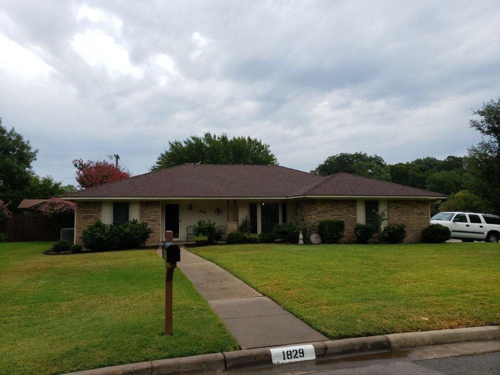 Slide of Cowtown Roofing