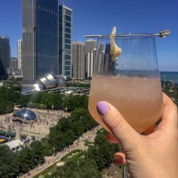 Cindy's Rooftop - Cindy's famous "Howl at the Jun" cocktail. The candied ginger garnish is a nice touch. Oh and look at that fab view! - New American Near Me - Chicago, Illinois Cindy's Rooftop - Cindy's famous "Howl at the Jun" cocktail. The candied ginger garnish is a nice touch. Oh and look at that fab view! - New American Near Me - Chicago, Illinois