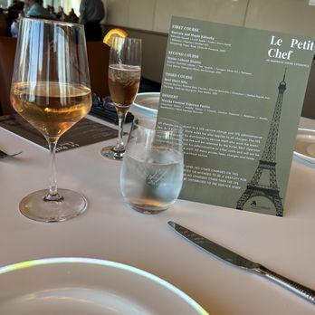 Le Petit Chef - Pre dinner bubbly, fist course wine pairing and the menu for that night. - New American Near Me - New York, New York Le Petit Chef - Pre dinner bubbly, fist course wine pairing and the menu for that night. - New American Near Me - New York, New York