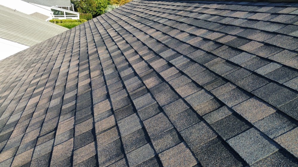 Slide of Whipple Roofing