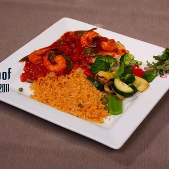 Mi Tenampa - a plate of food on a table - Mexican Near Me - Indianapolis, Indiana Mi Tenampa - a plate of food on a table - Mexican Near Me - Indianapolis, Indiana