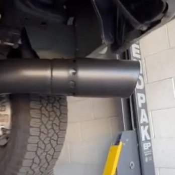 Extreme Conversions and Mufflers - View from underneath showing intercooled tip finished in a high-temperature satin black. - Auto Repair Near Me - Riverside, California
