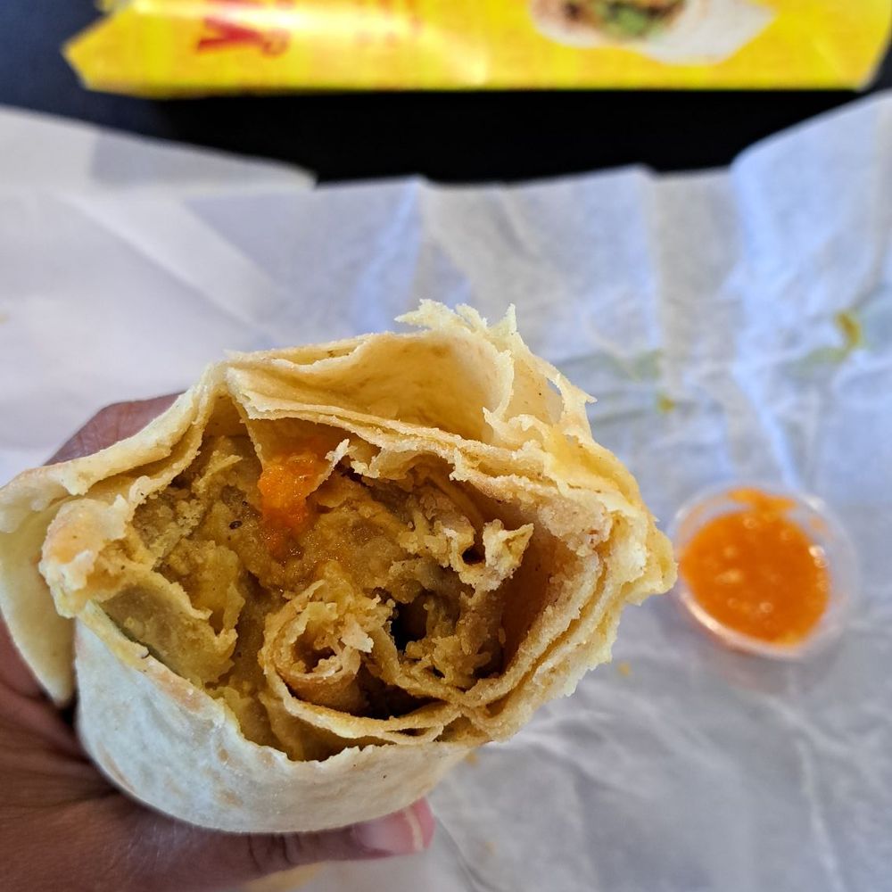 Roopram - Delicious chicken and roti - Indian Near Me - Orlando, Florida
