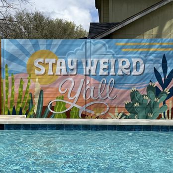 Purple Fencing - Mural painted on a stained horizontal cedar fence with black visible metal posts - Fences & Gates Near Me - Austin, Texas Purple Fencing - Mural painted on a stained horizontal cedar fence with black visible metal posts - Fences & Gates Near Me - Austin, Texas