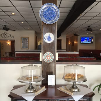 Green Olive Restaurant - Nice Turkish decor and display of desserts (kadayif and pistachio baklava). - Mediterranean Near Me - Columbia, South Carolina Green Olive Restaurant - Nice Turkish decor and display of desserts (kadayif and pistachio baklava). - Mediterranean Near Me - Columbia, South Carolina