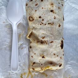 Rosie's - The size of the burrito (spoon on the side for the length) $12