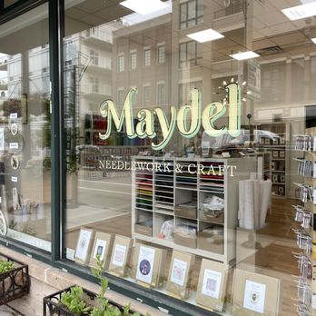 Maydel - The outside of a shop in a brick building with flower boxes outside and a painted gold window sign that says Maydel - Art Classes Near Me - Chicago, Illinois Maydel - The outside of a shop in a brick building with flower boxes outside and a painted gold window sign that says Maydel - Art Classes Near Me - Chicago, Illinois