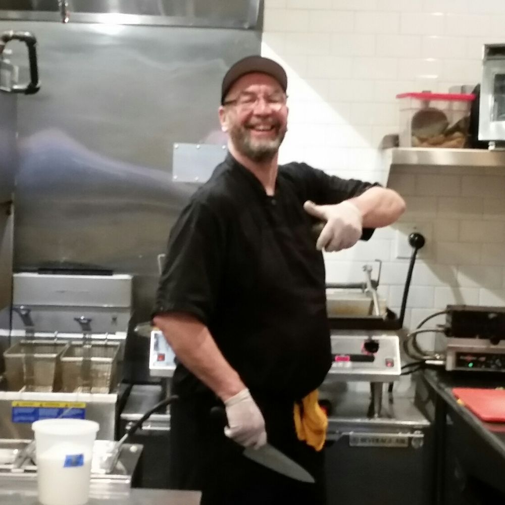 Kitchenette - This is John, hamming it up in the kitchen - Breakfast & Brunch Near Me - Templeton, California Kitchenette - This is John, hamming it up in the kitchen - Breakfast & Brunch Near Me - Templeton, California