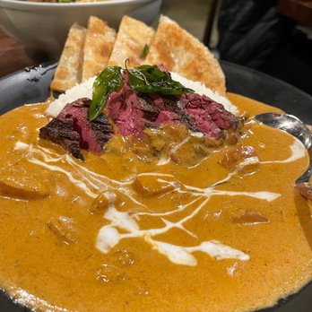Hanuman Thai Eatery - masaman (potato curry) with medium rare steak - Thai Near Me - Costa Mesa, California Hanuman Thai Eatery - masaman (potato curry) with medium rare steak - Thai Near Me - Costa Mesa, California
