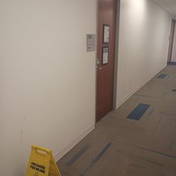 Labcorp - Blood splatter marked by yellow caution sign mere feet from the entrance.