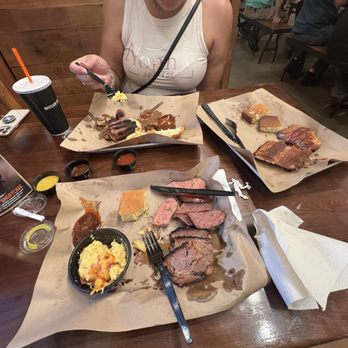 Mission BBQ - Pic of 2 meat platter and brisket sandwich along with ribs! I love all of the sauce options (mix em up to make the perfect blend) - Barbeque Near Me - Boynton Beach, Florida