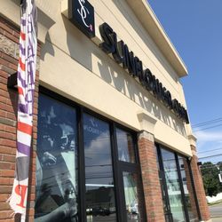 Sunflower Chen Nail Spa - Corner store sign